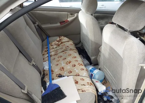 2004 Toyota Corolla Le z USA, uszkodzony, nr VIN 2T1BR38E14C207850